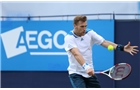 EASTBOURNE, ENGLAND - JUNE 14: Daniel Smethurst of Great Britain plays a backhand against Somdev Dewarman of India during their Men's Singles second round qualifying match on day one of the Aegon International at Devonshire Park on June 14, 2014 in Eastbourne, England.  (Photo by Steve Bardens/Getty Images)